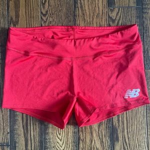 New Balance red exercise shorts
